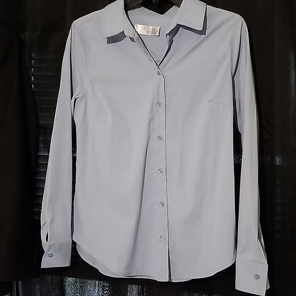 Light blue polyester blend blouse long sleeve.